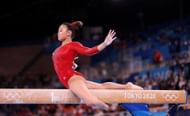 Sunisa Lee performs for Team USA at the delayed 2020 Tokyo Olympics, 2021(Photo by Laurence Griffiths/Getty Images)